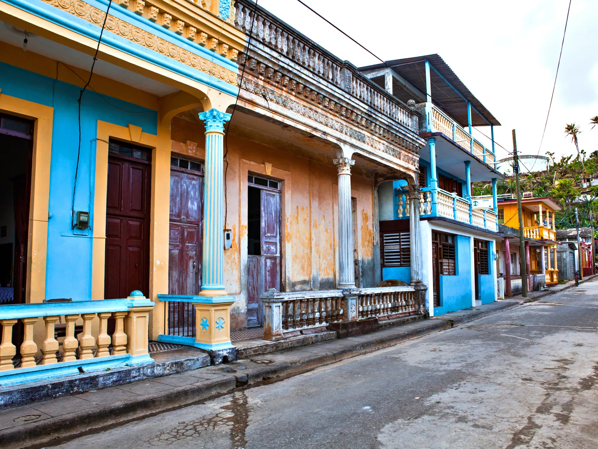 shutterstock_597131270 Old colorful houses in Baracoa, Cuba.jpg