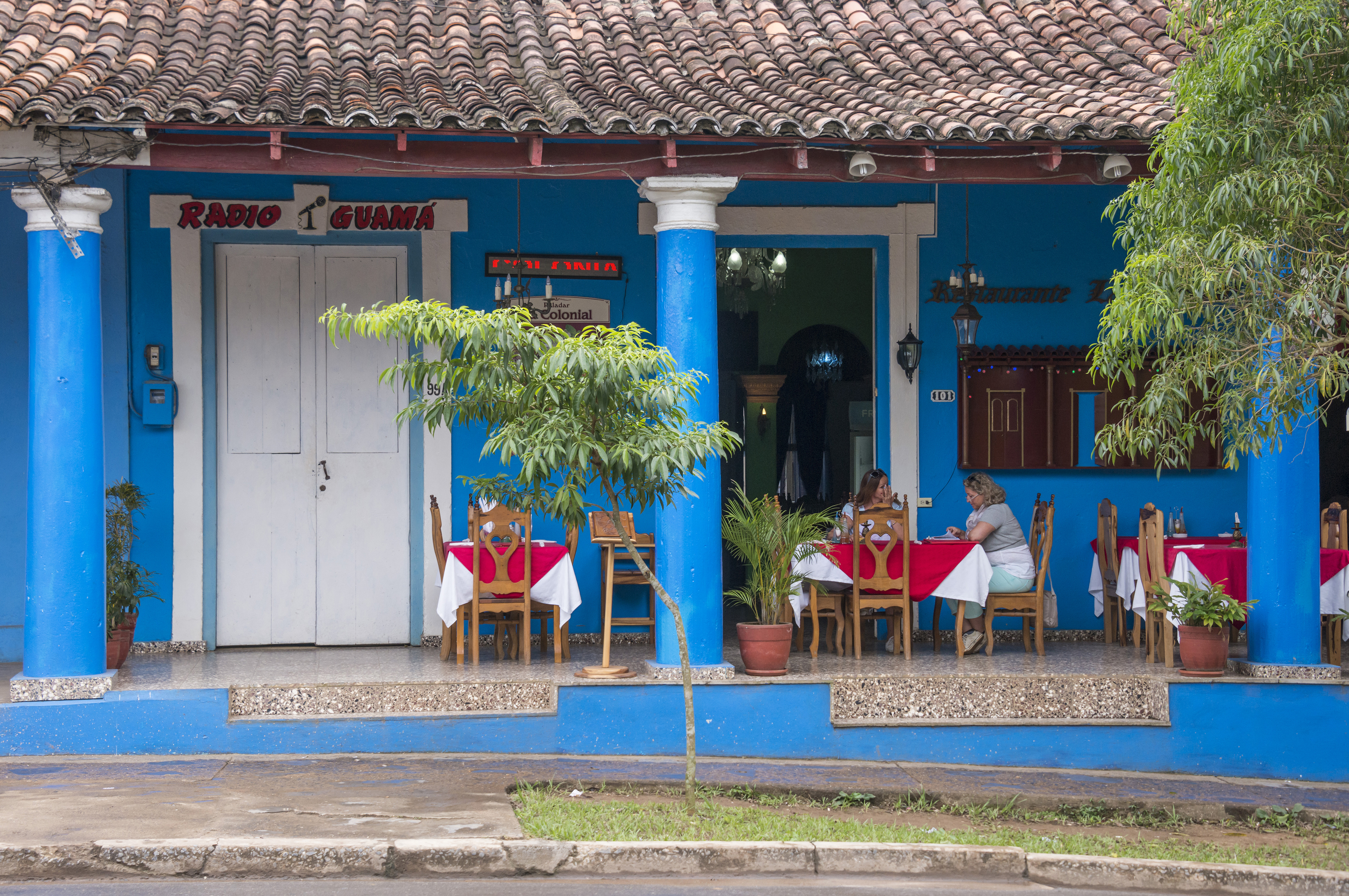 shutterstock_577247881 Terrace of a restaurant, installed in one of the old houses of the town of Vinales.jpg