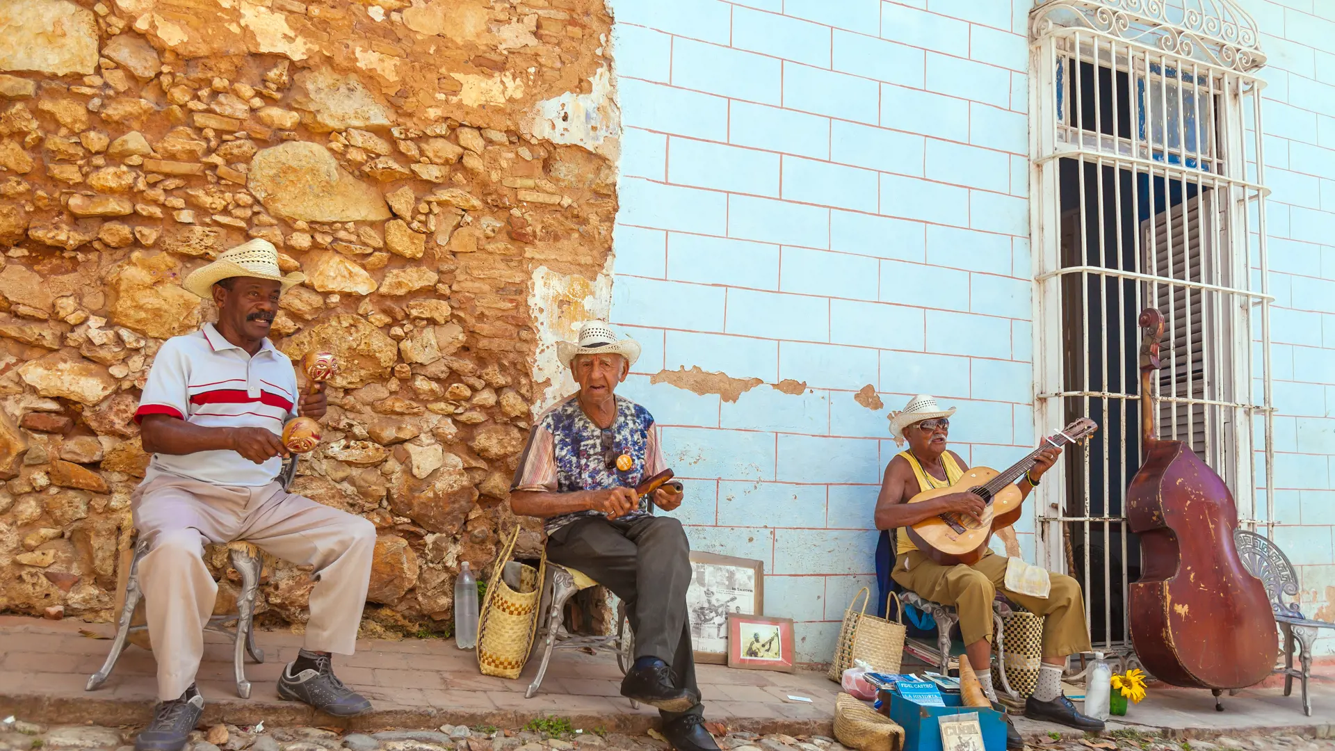 shutterstock_589667297 TRINIDAD, CUBA - MARCH 30, 2012 Street musicians perform.jpg