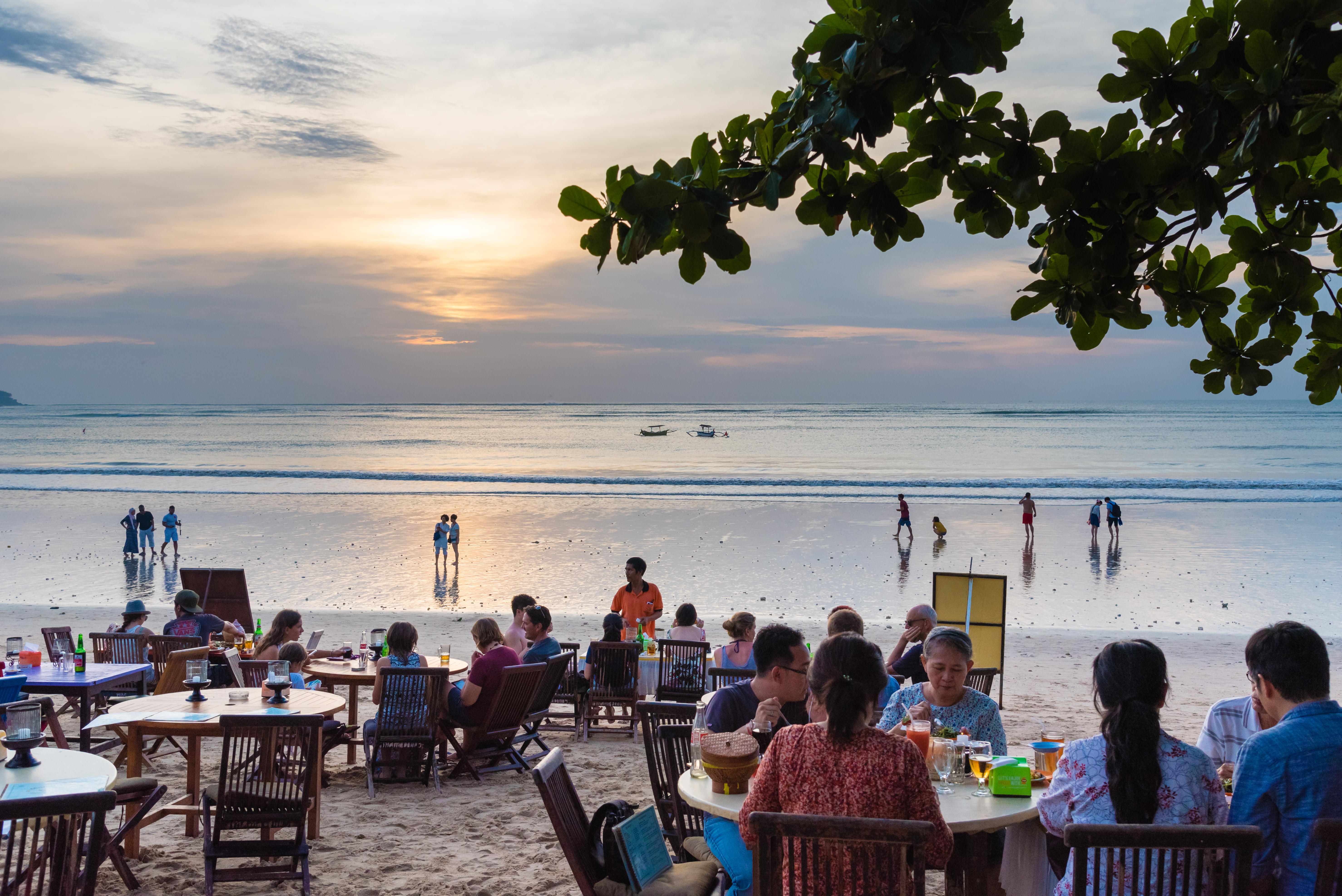 shutterstock_720684154 Jimbaran tropical beach is a main popular balinese attraction, famous for the clear, aqua blue water and sea food.jpg
