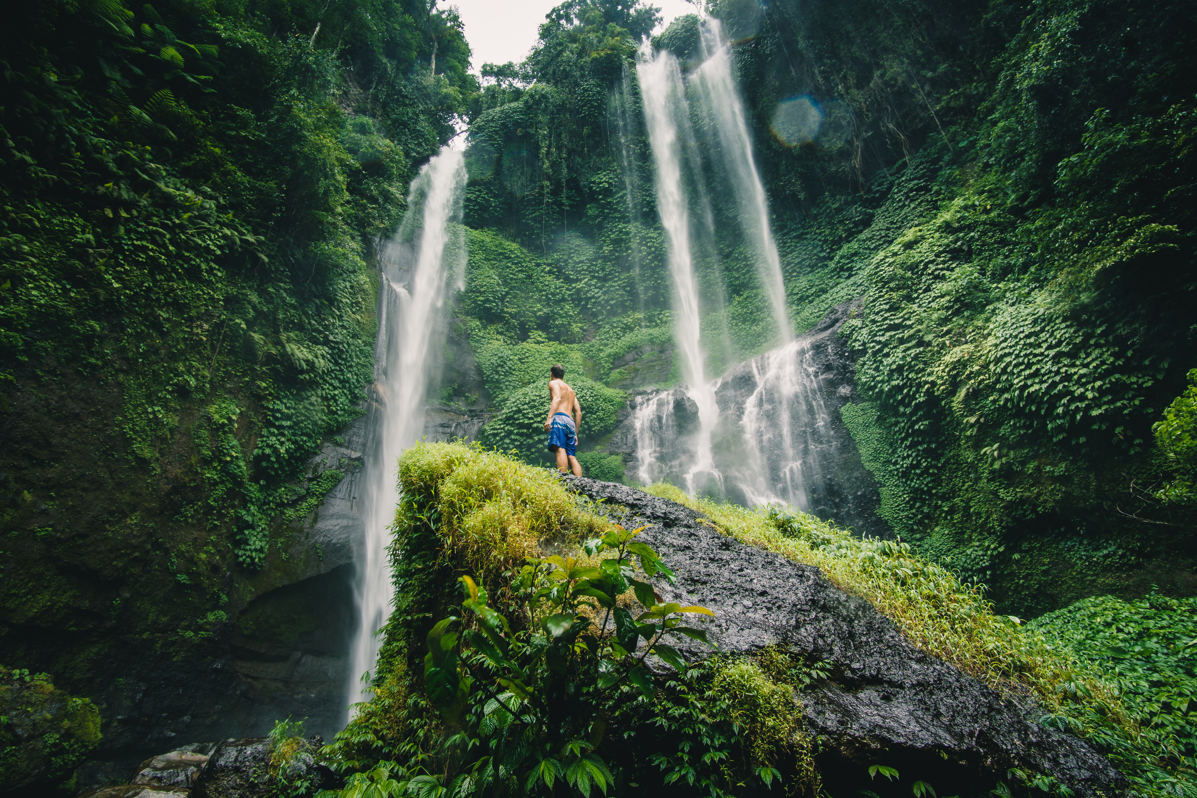 Sekumpul waterfall in Bali surrounded by tropical forest.jpg