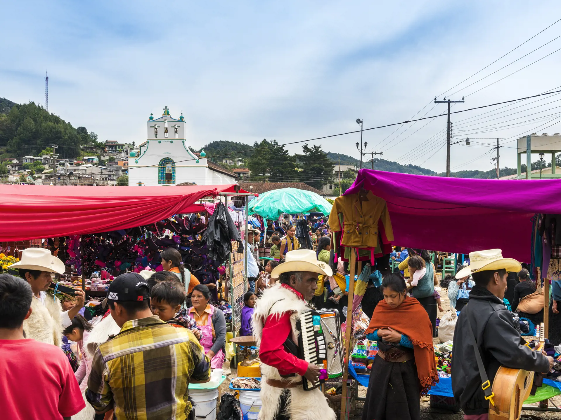 shutterstock_548464801 Local people in a street market in the town of San Juan Chamula.jpg