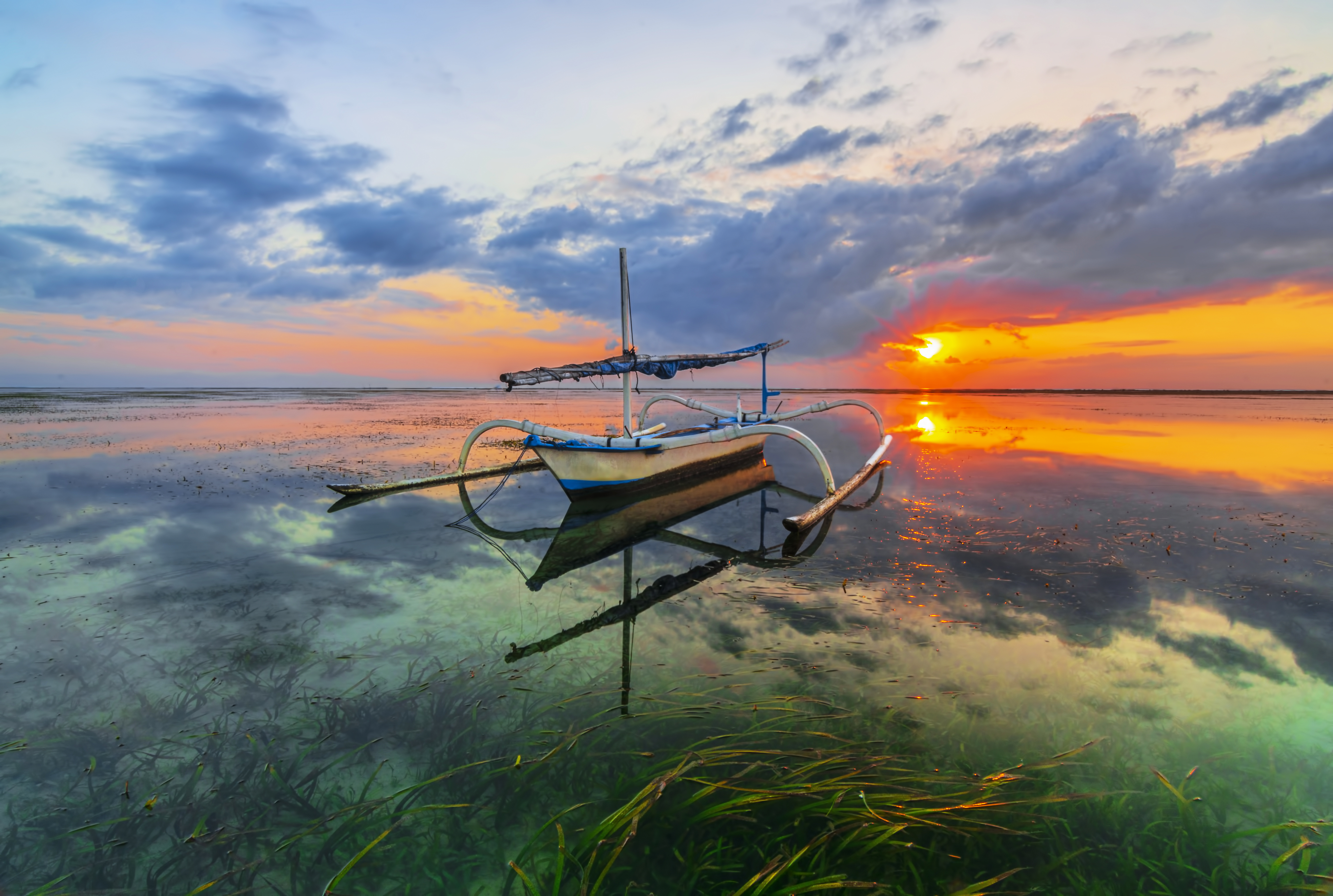 Morning Reflektion at Sanur Beach Island Bali by making Jukung a Point Of Interest.jpg (1)
