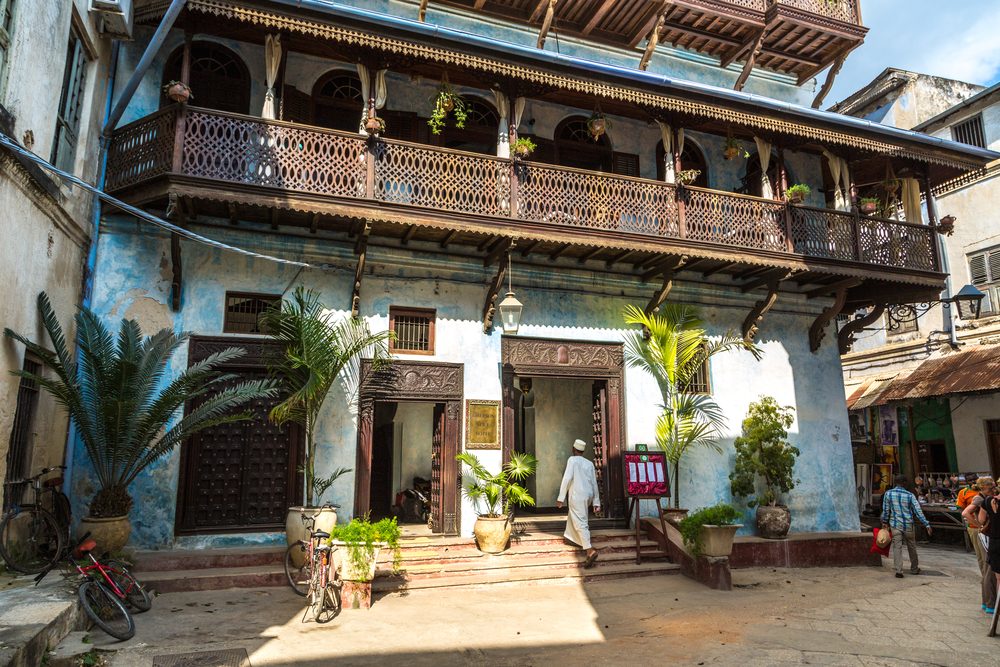 Local People On A Typical Narrow Street In Stone Town