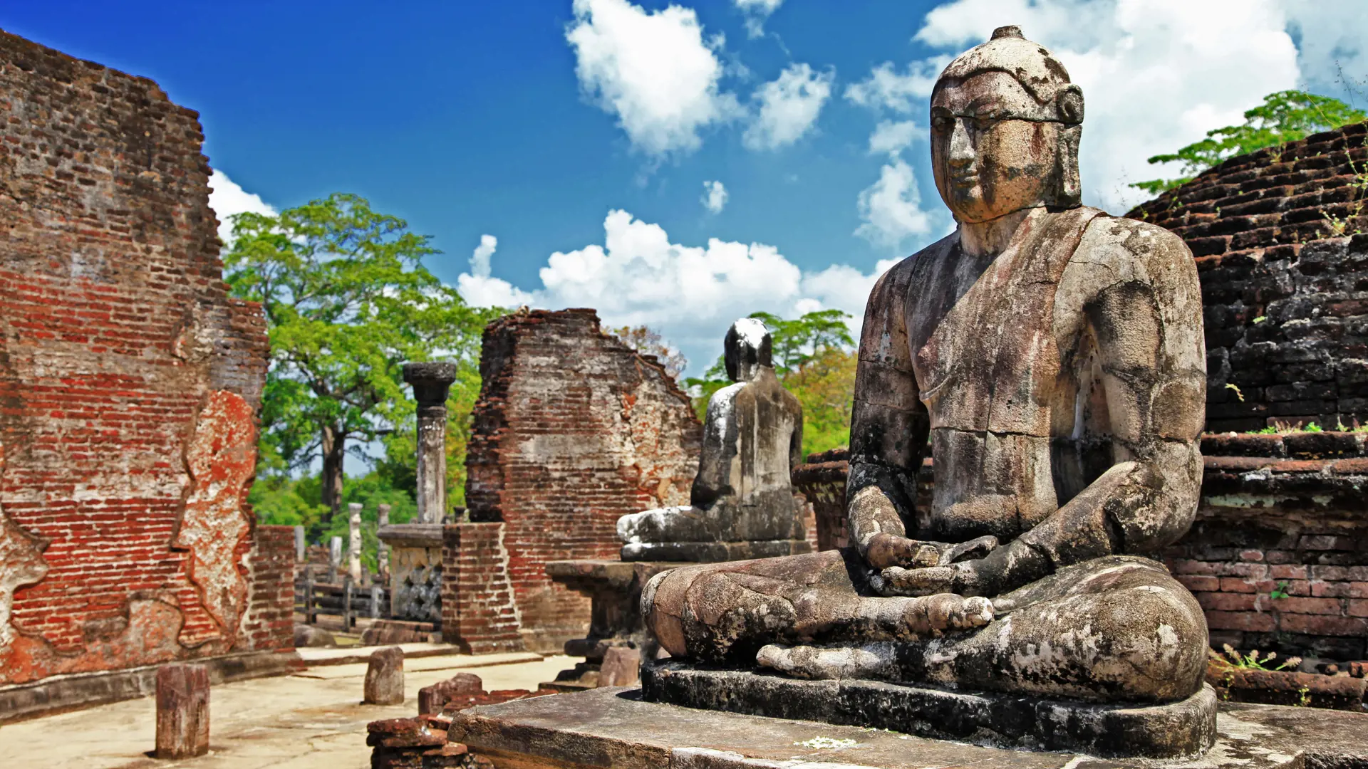 shutterstock_172070429 Buddha in Polonnaruwa temple - medieval capital of Ceylon,UNESCO.jpg