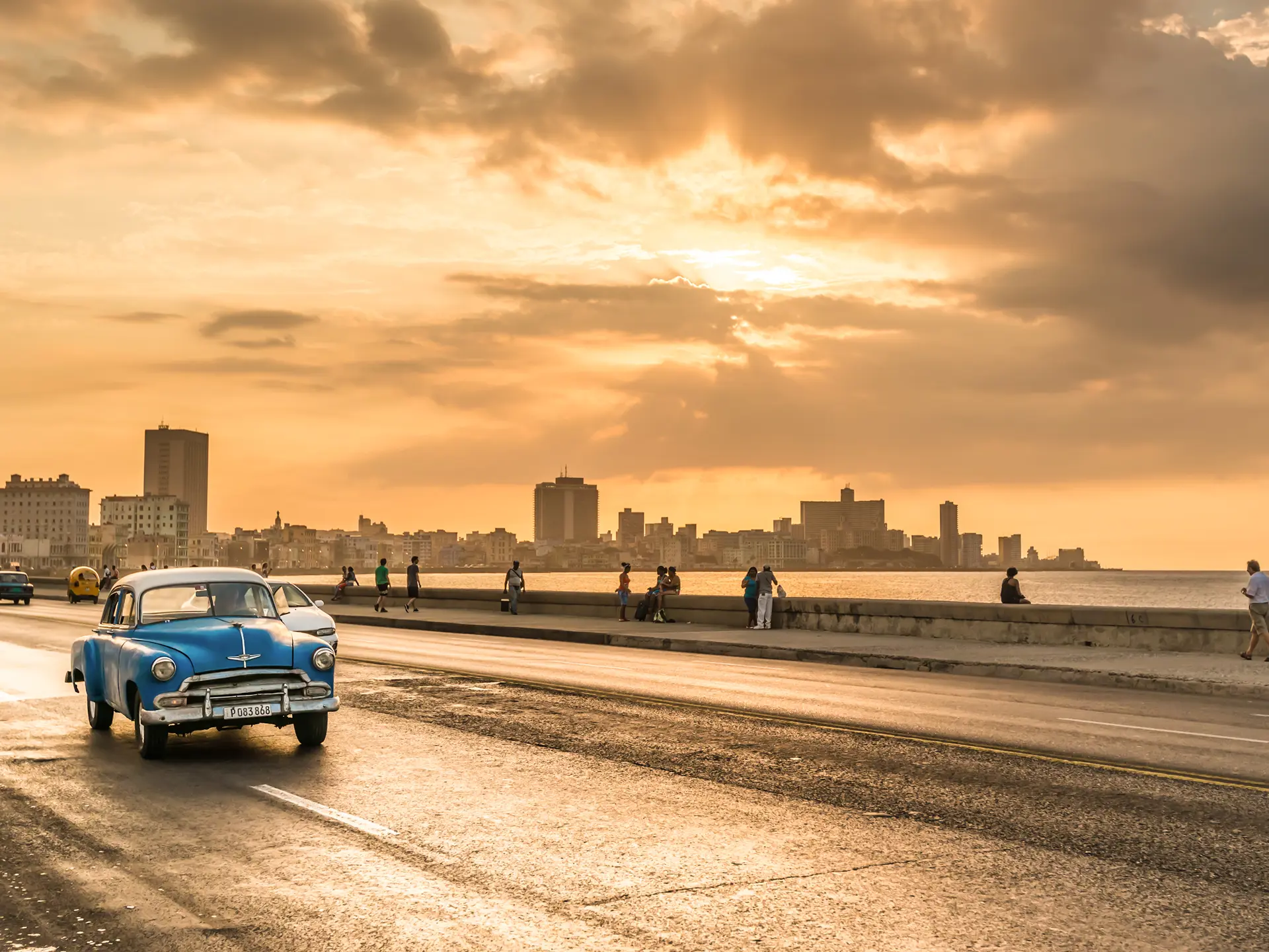 shutterstock_259731410  Vintage american car at the Malecon.jpg