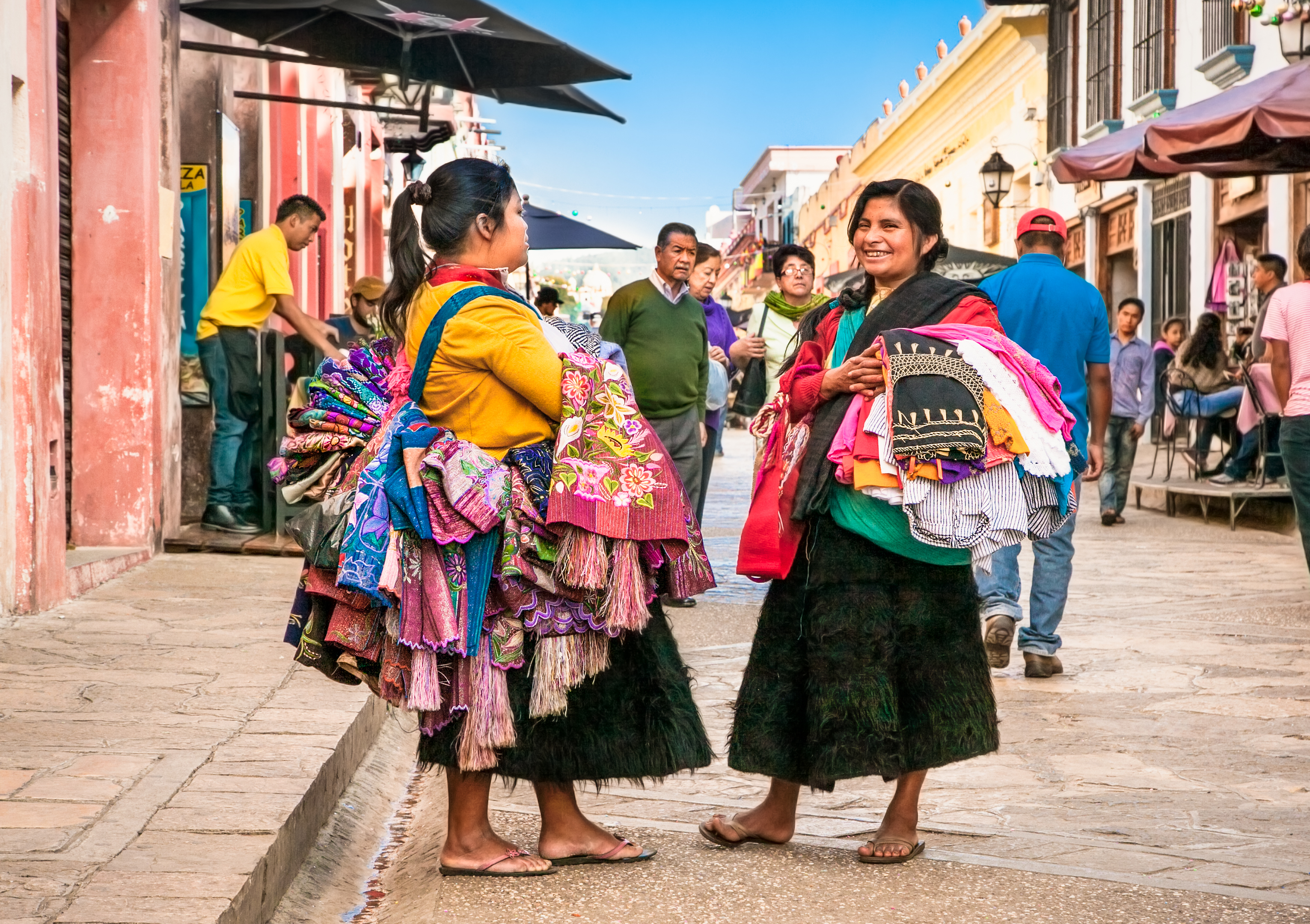 shutterstock_539658217 SAN CRISTOBAL, MEXICO-DEC 13, 2015Tzotzil Maya people saling the traditional clothes at street of San Cristobal de las casas.jpg