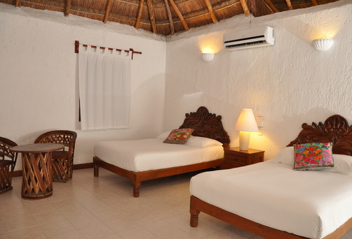 ISLA MUJERES - Du har sex nätter på det mysiga hotellet Na Balam, där du bor i ett rymligt Standard Poolside Room.