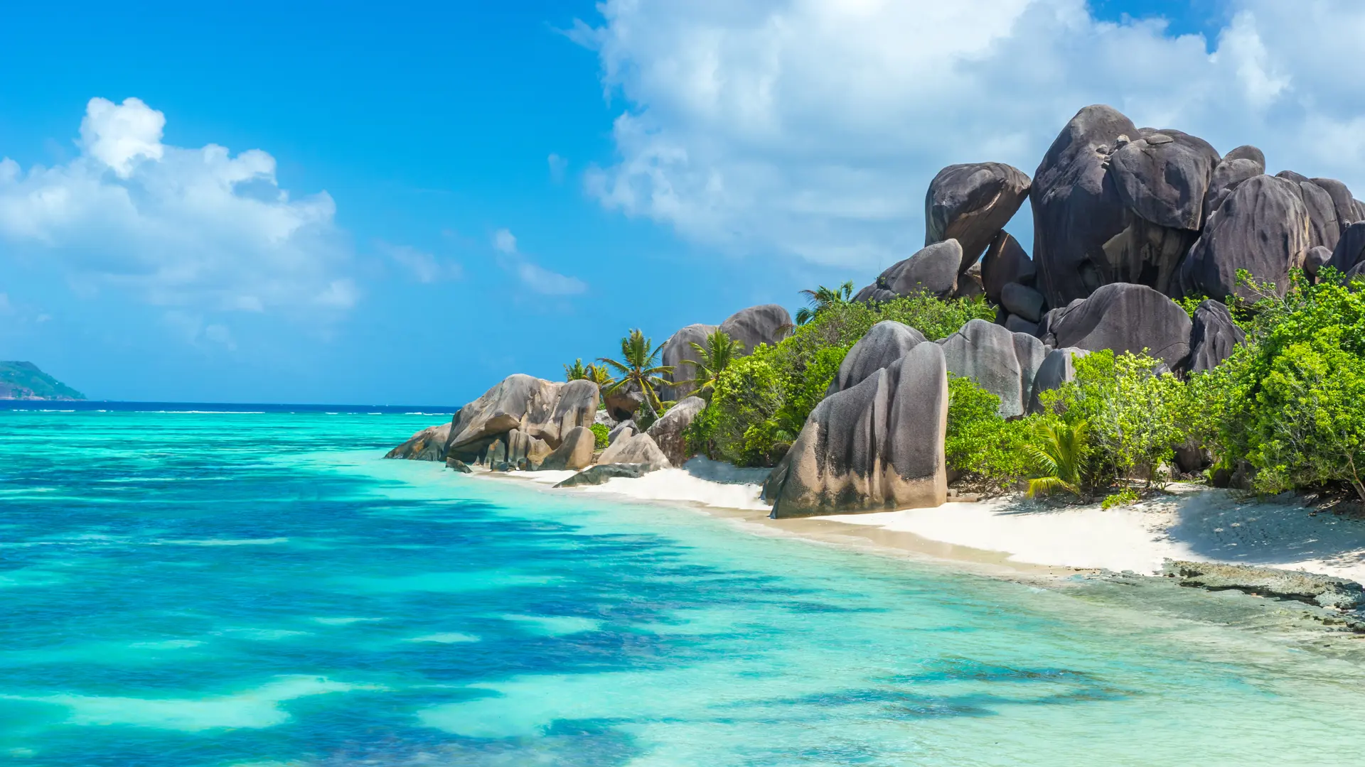 shutterstock_303523277 Anse Source d'Argent - granite rocks at beautiful beach on tropical island La Digue in Seychelle.jpg