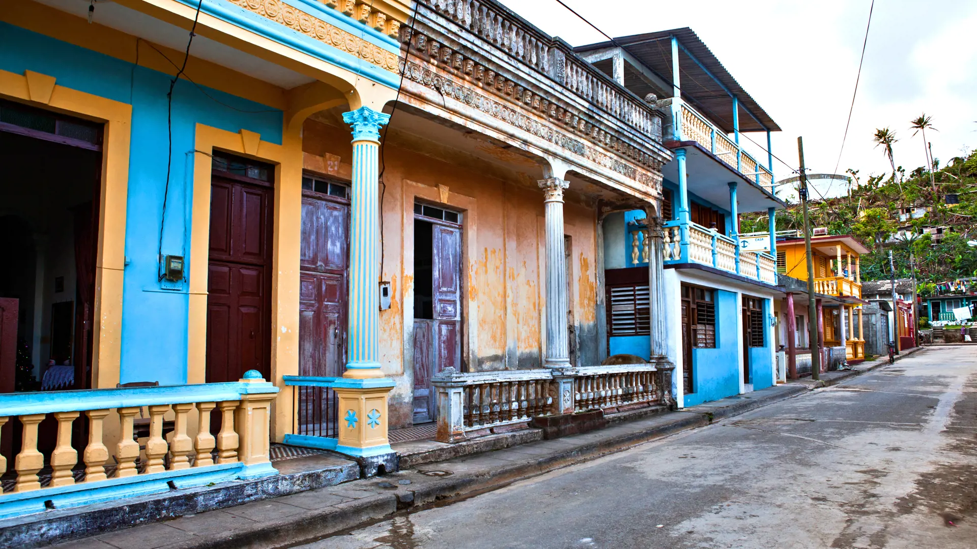 shutterstock_597131270 Old colorful houses in Baracoa, Cuba.jpg