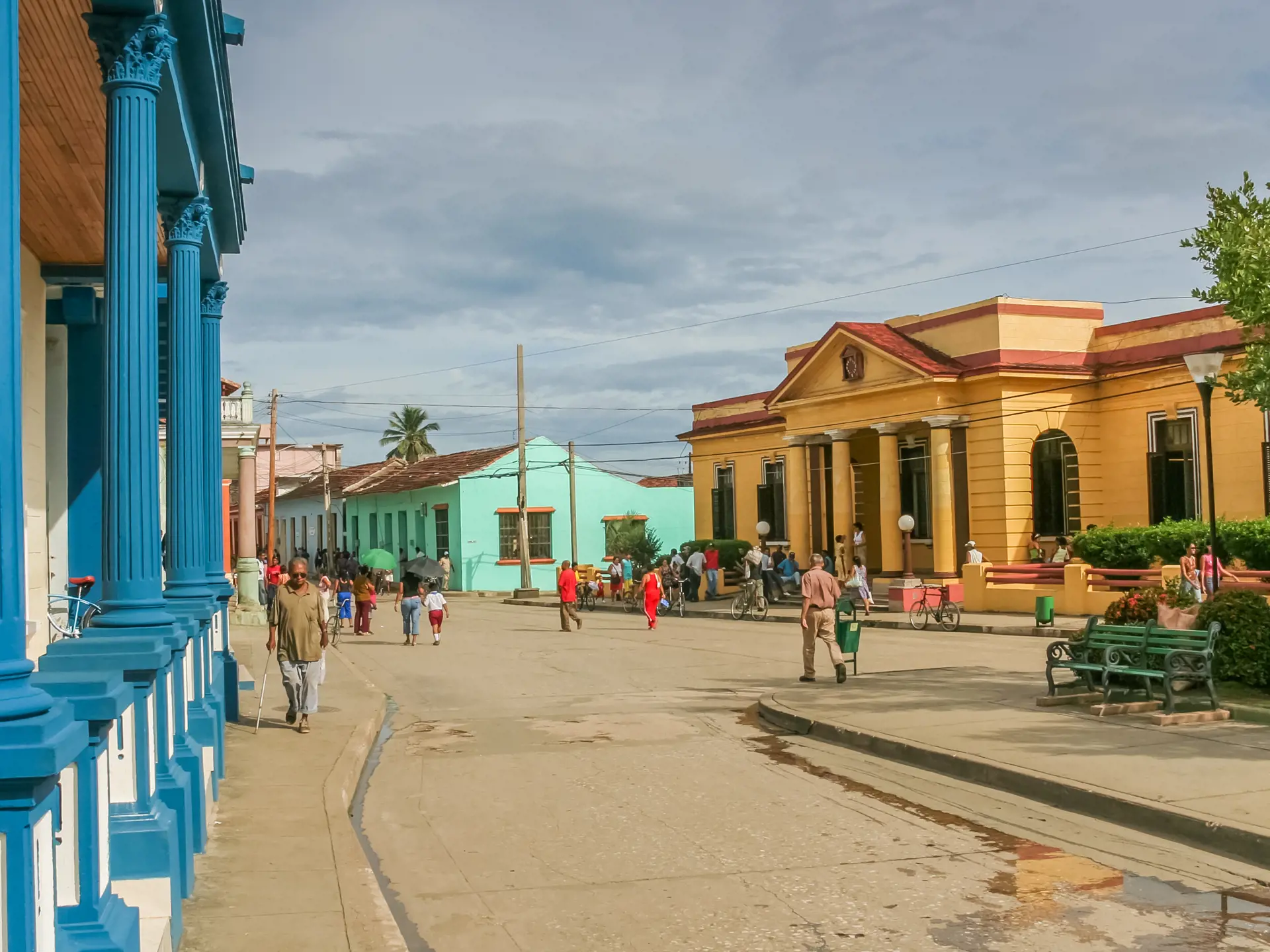 shutterstock_451773604 Street with colorful houses in colonial town Baracoa, Cuba.jpg