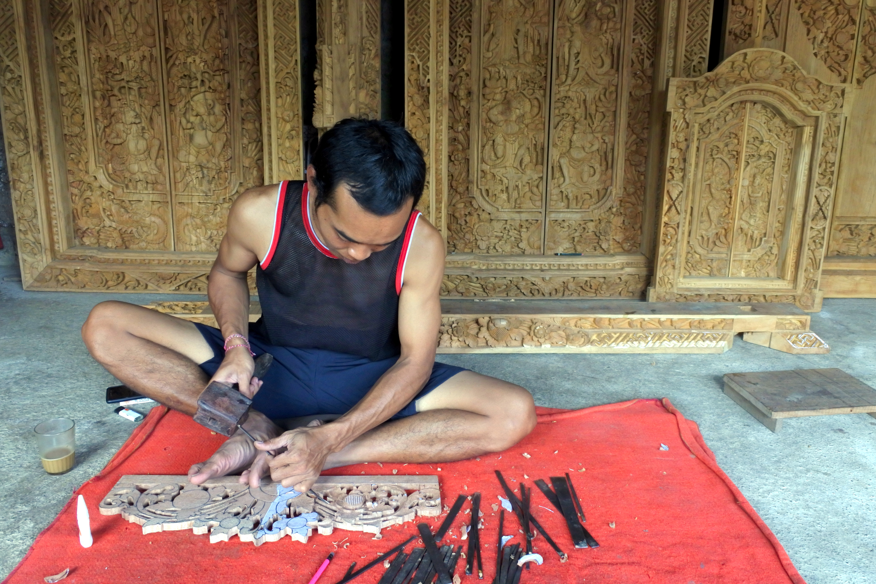 Shutterstock 1483053101 (Indonesia Man (Male Age 30 40) Wood Carver Carving Sculptures In Mas, Bali Indonesia. Real People. Copy Space ) (1)