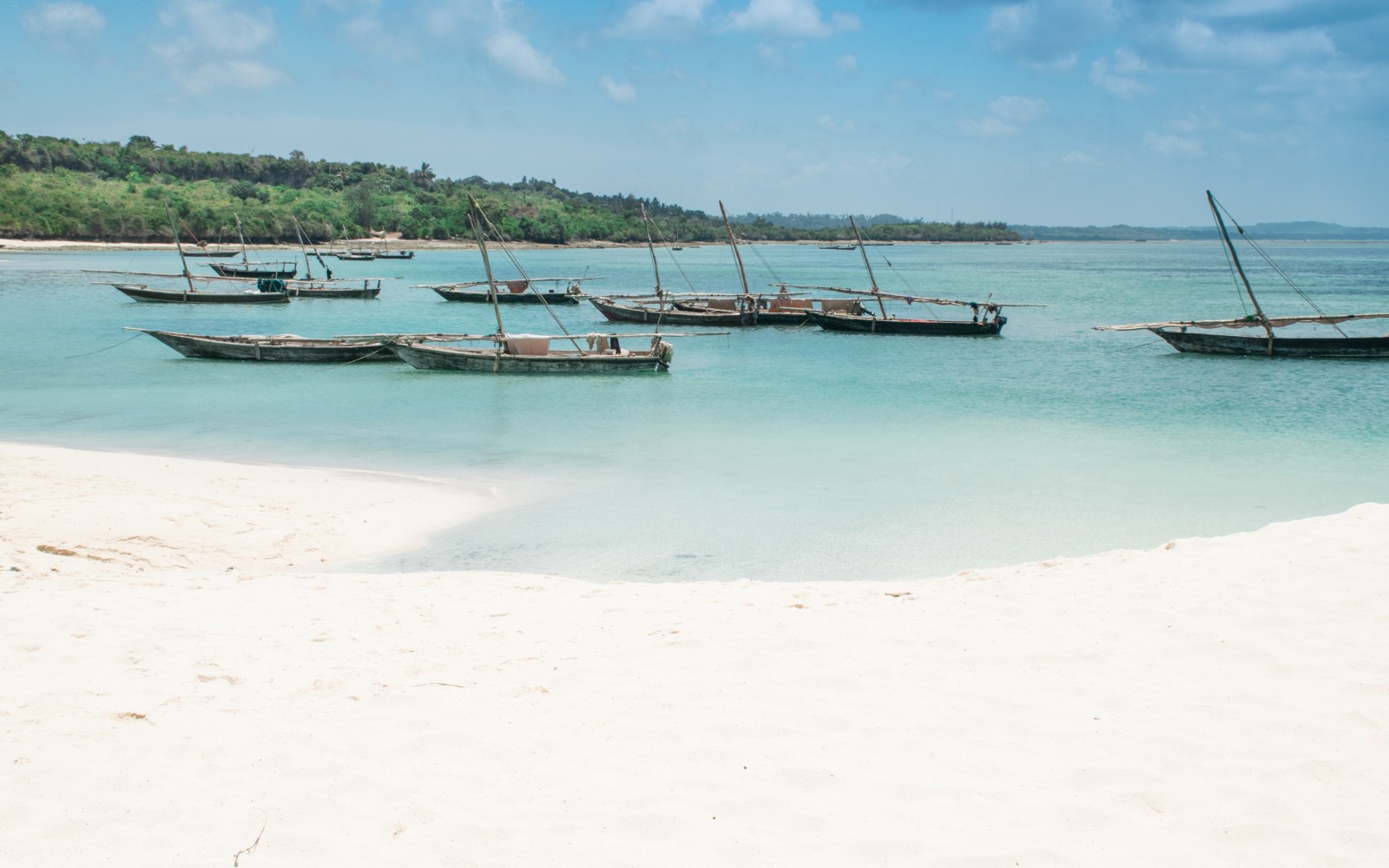 African Long Boats And Tropical Beach Nungwi Zanzibar