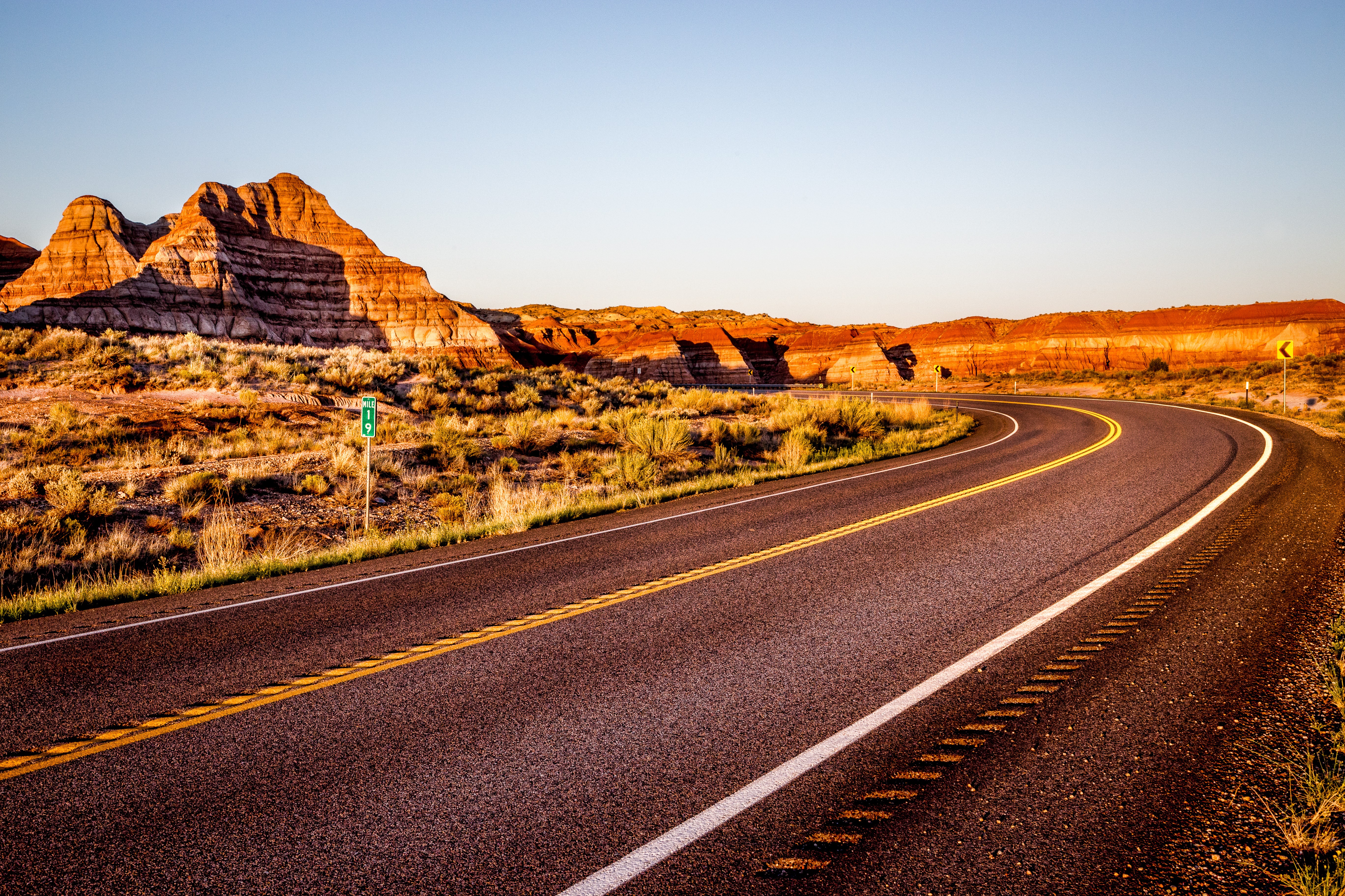 Shutterstock 712271848 Scenic Highway Winds Through Red Sandstone Spires In Red Canyon, Near Bryce National Park At Dusk